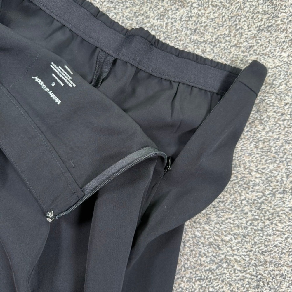 Ministry of Supply Kinetic Tapered Pants Womens 6 Black Pleated Stretch Trousers - Picture 3 of 9